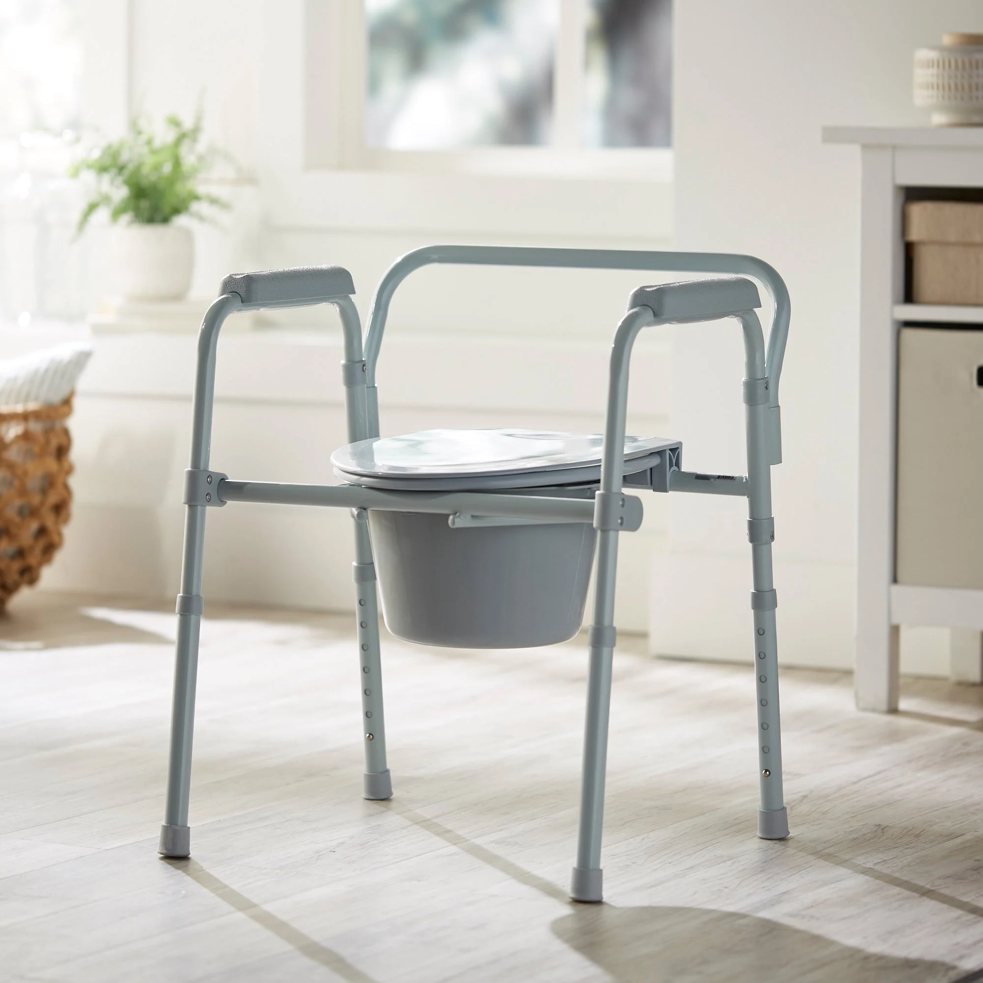 McKesson Brand McKesson Folding Fixed Arm Steel Commode Chair, 16-2/3 – 22½ Inch Height - Image 3